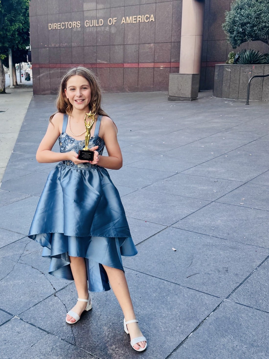 Ashleigh Walker with her Young Artist Academy Award in Los Angeles